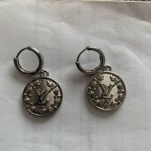 Elegant Silver Hoop Earrings with Medallion